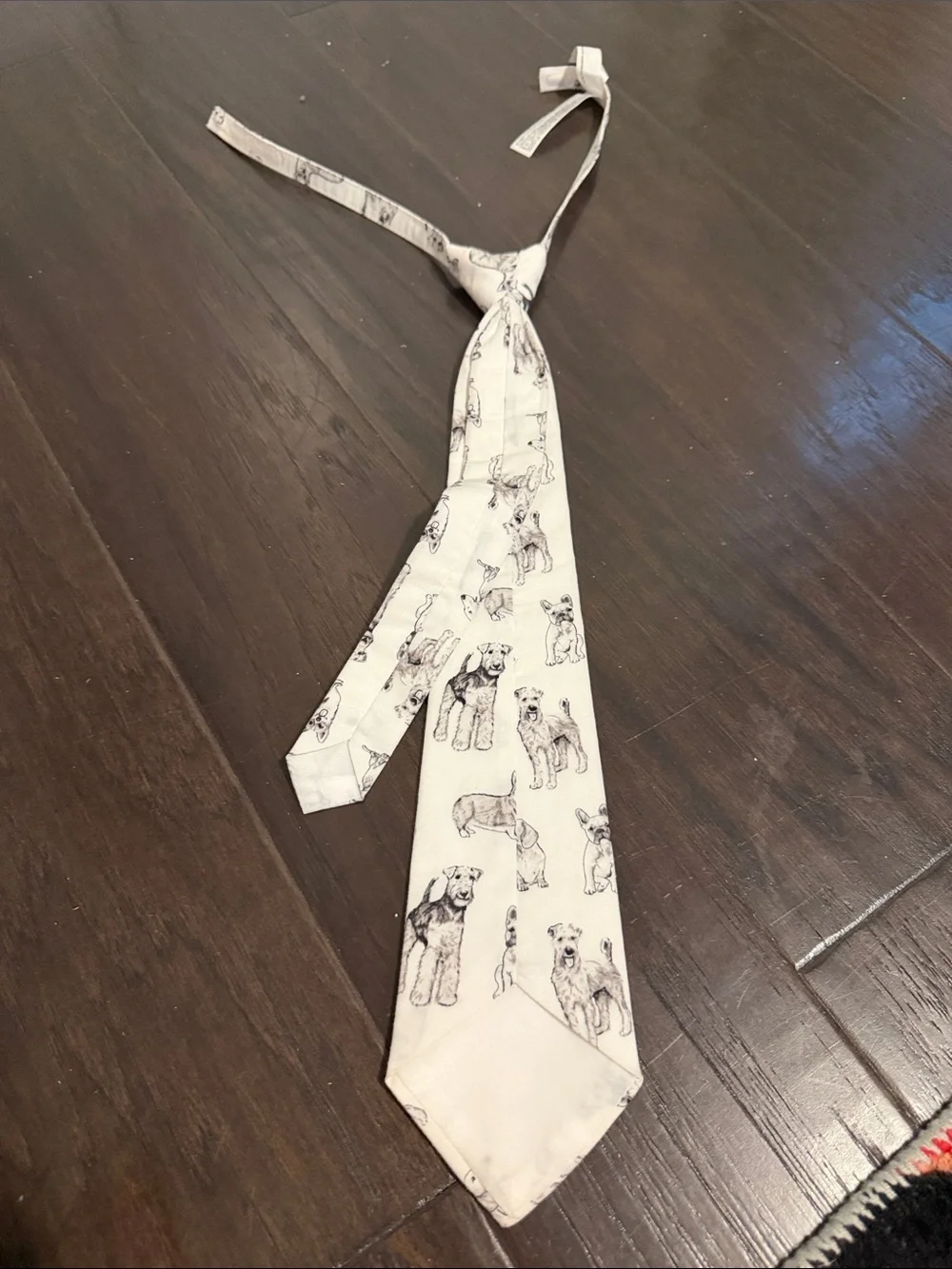 Janie and Jack Cream Tie with Black Dog Sketches